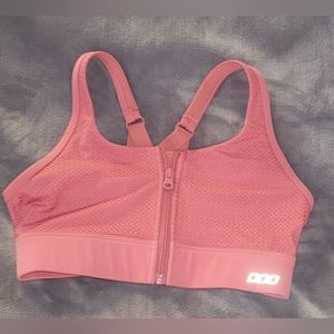 Sports top, zip front, pads included